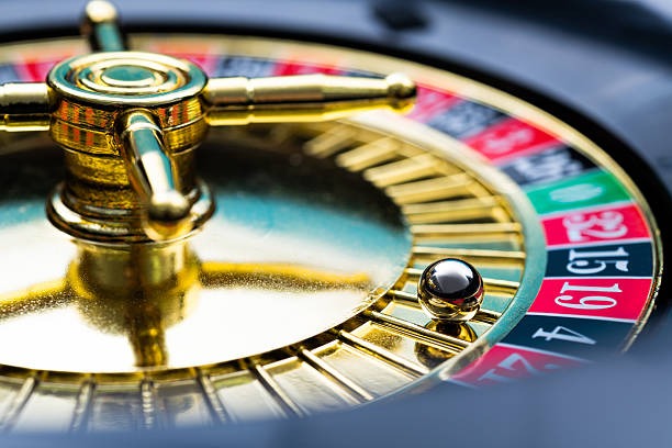 Live baccarat table displayed on tablet with bonus balance indicator